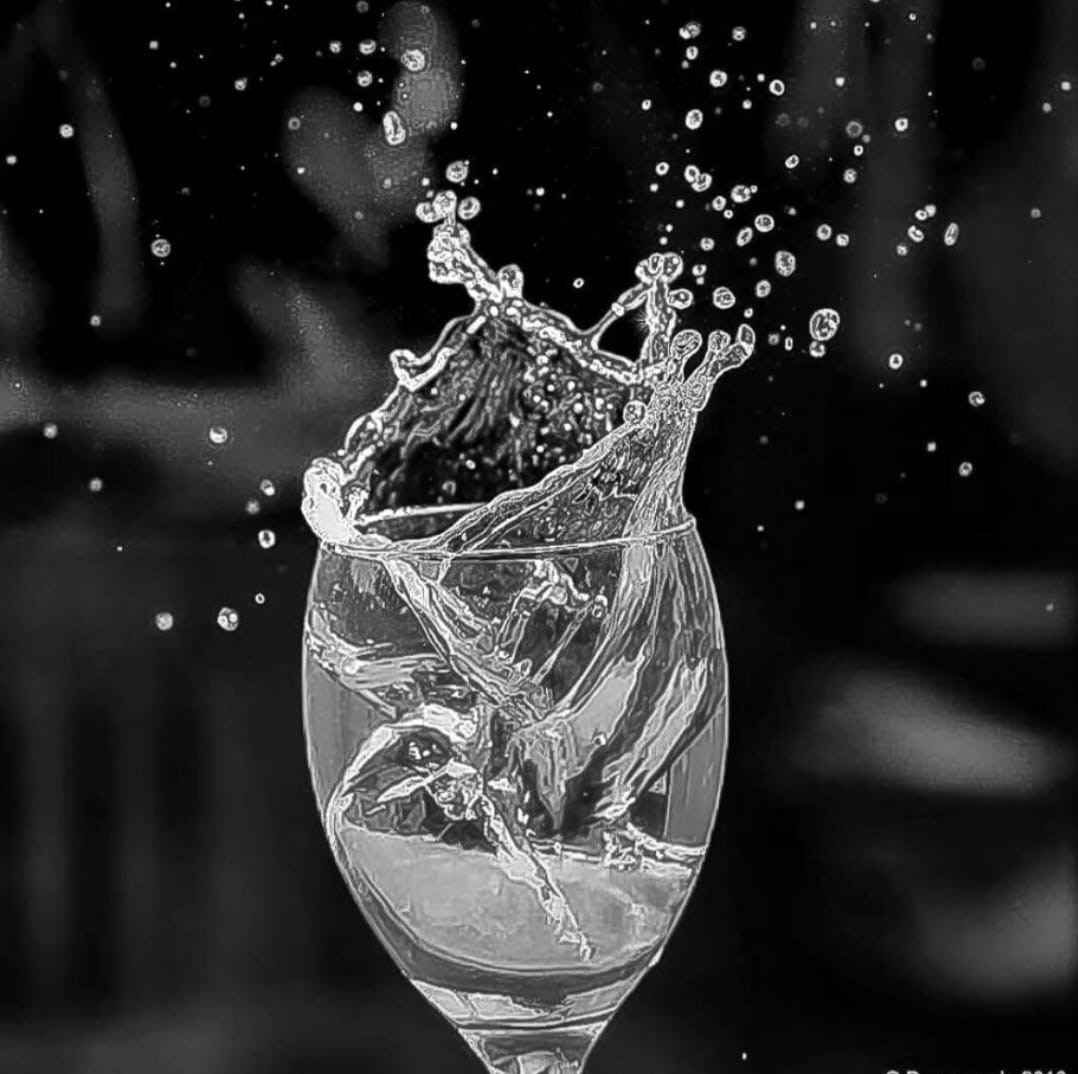 A splash of water by Donna Maria Long