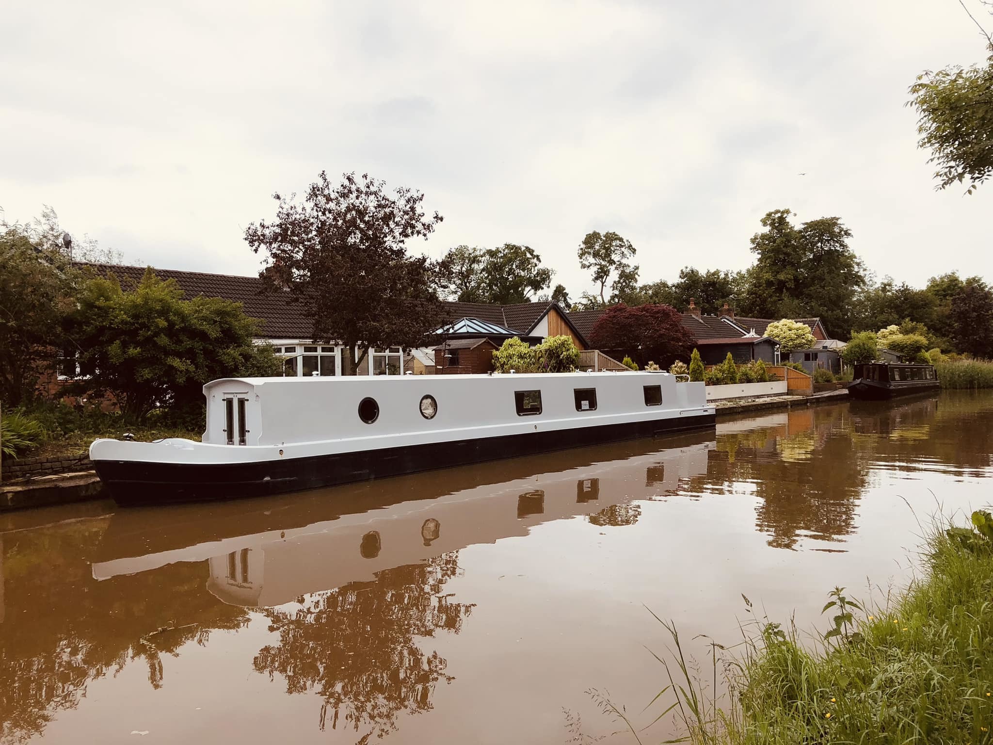 Canal boat reflection in Middlewich by Ryan Mottram