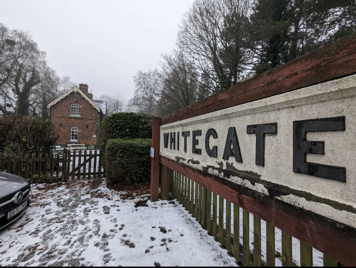 Old railway sign, Whitegate cafe by Lisa Lacking